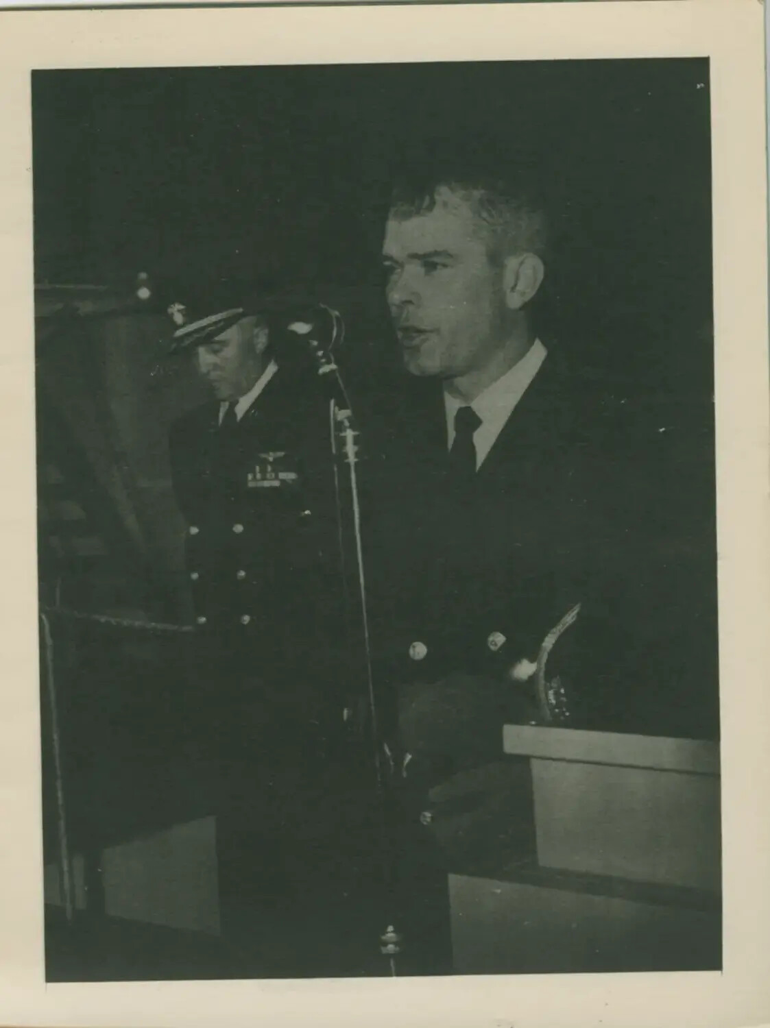 Speaker Addressing Audience at USS Petrof Bay (CVE-80) Commemorative Event