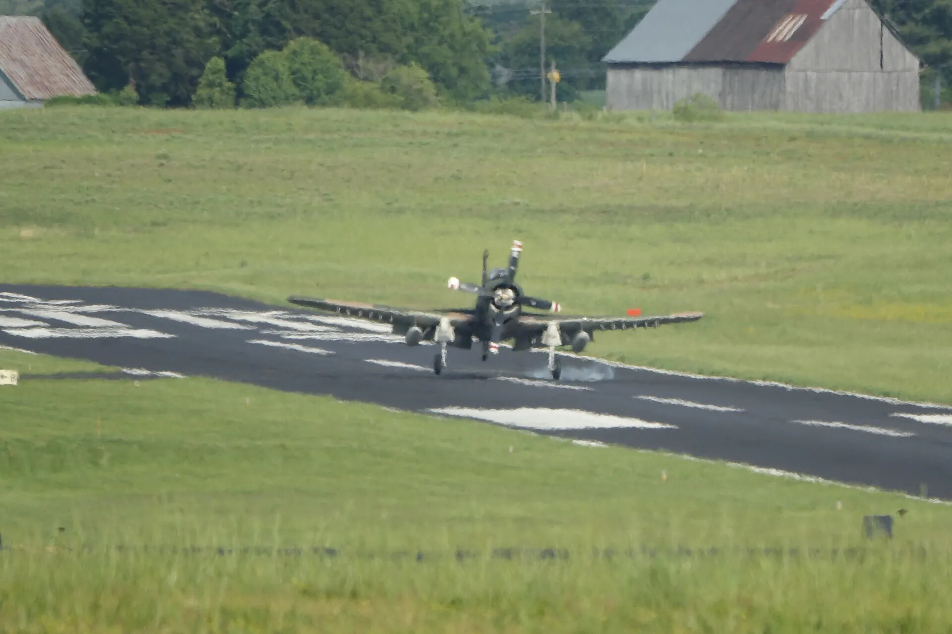 A-1 Skyraider Touching Down at Warbird Fly-In Event, 3-4 May 2019