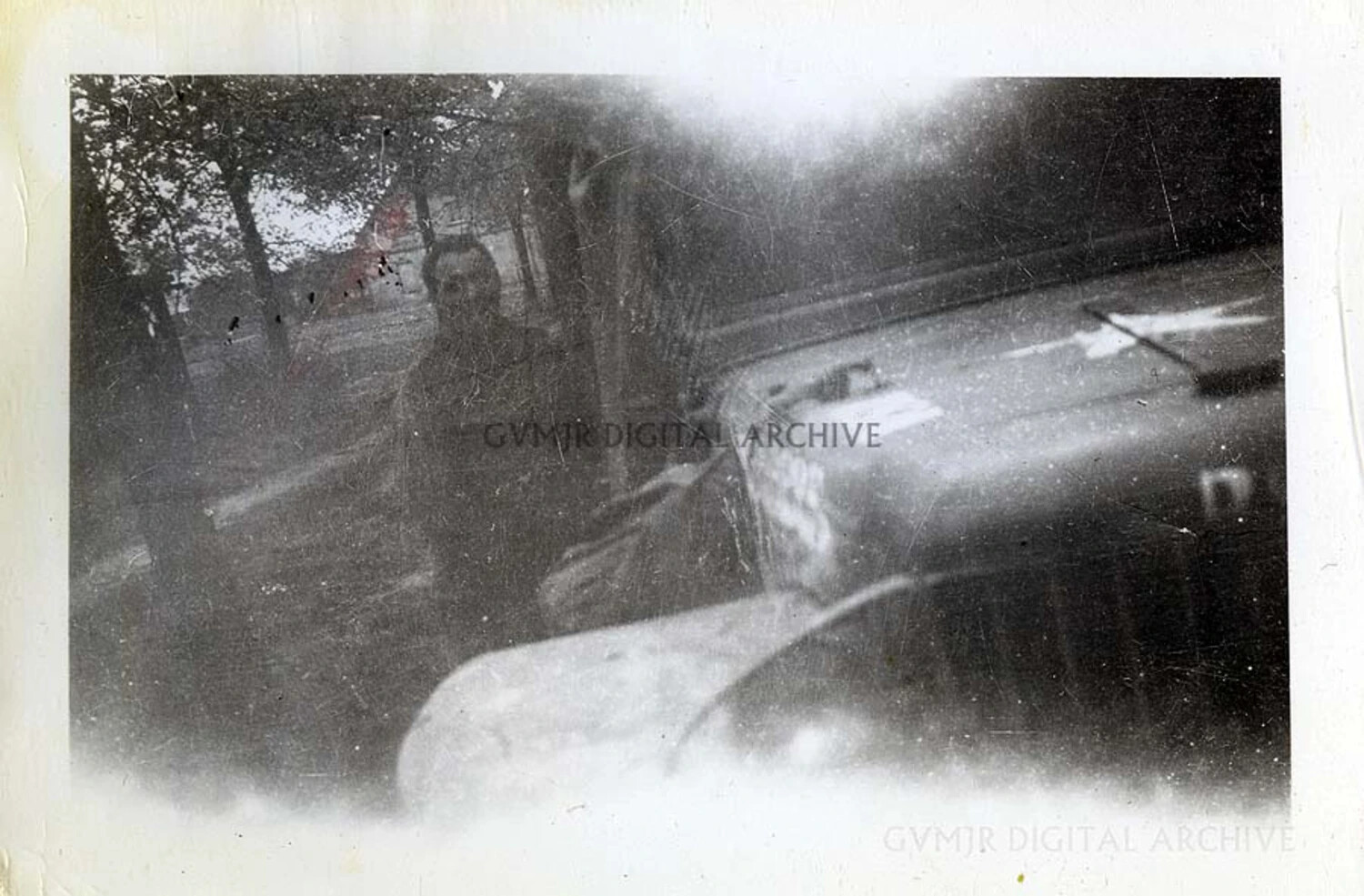 Damaged/Overexposed Snapshot of Soldier and Vehicle, 101st Airborne Division Collection, European Theater, 1944-1945