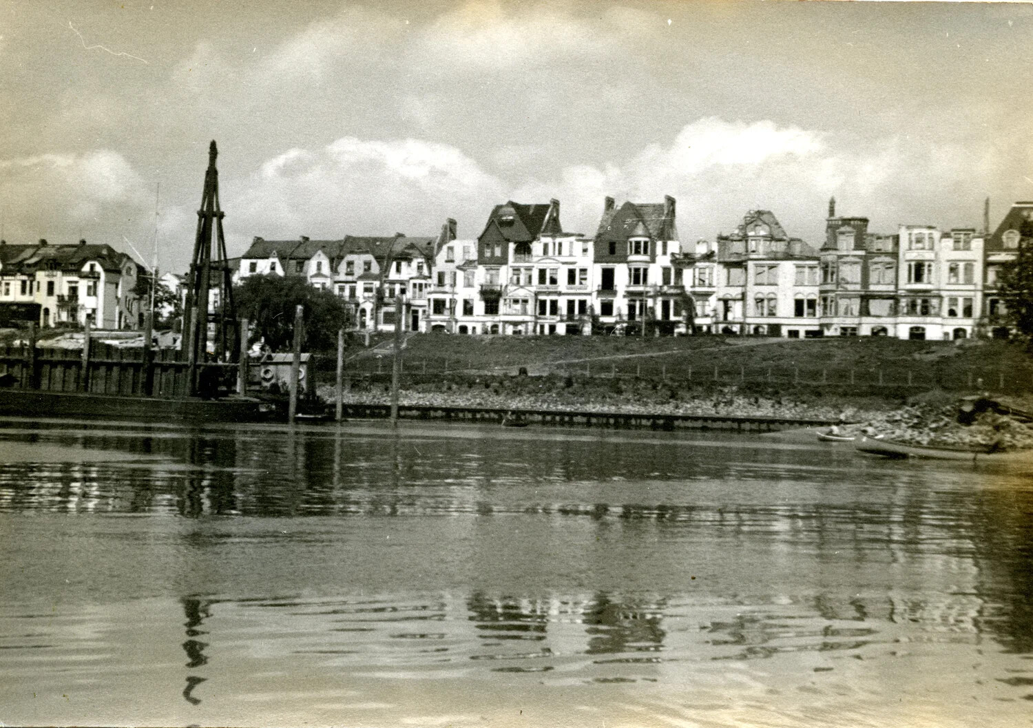 Bomb-Damaged Riverside Townhouses, German River City, WWII Era