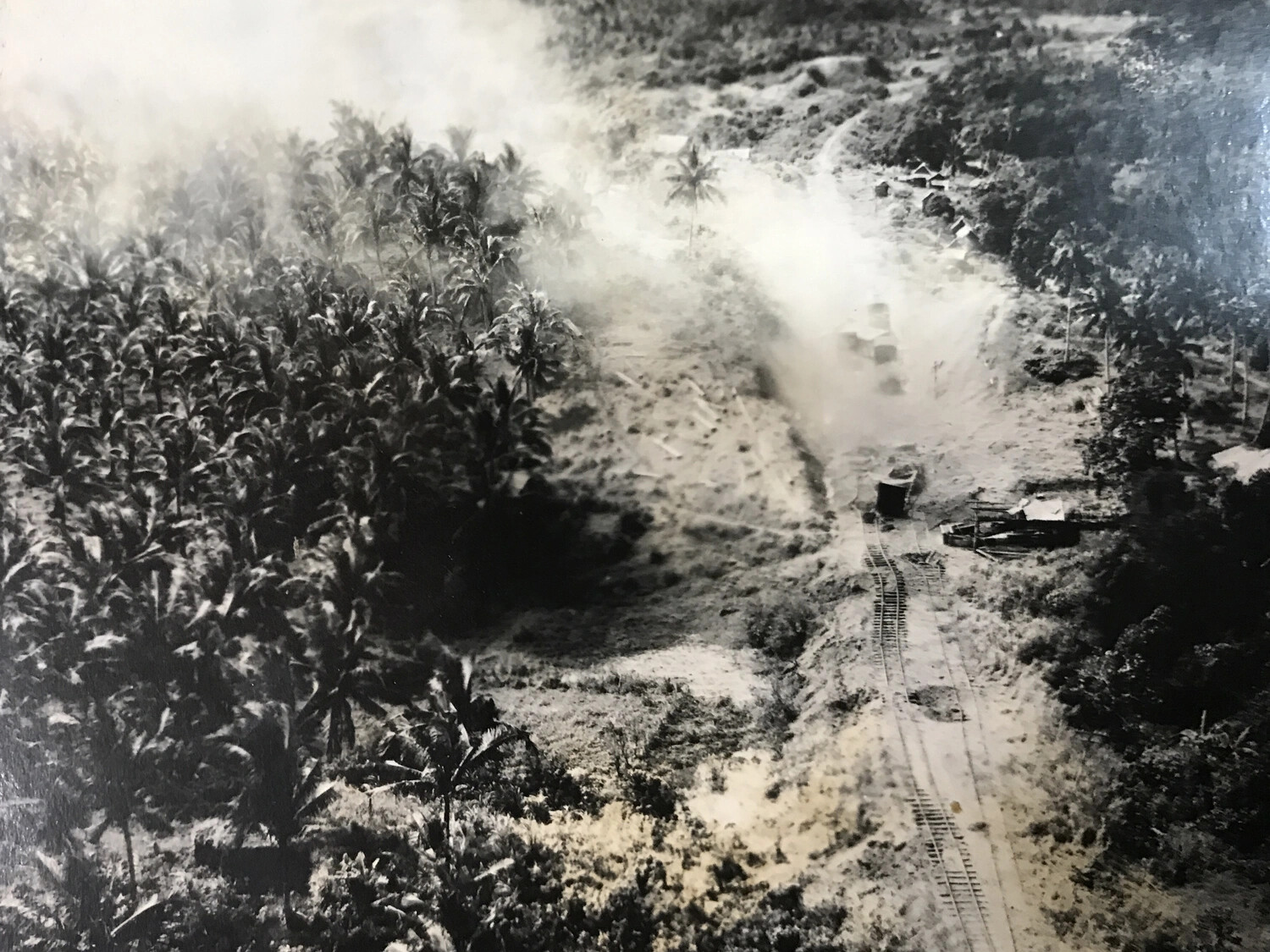 Bomb Strike on Narrow Rail Line in Coconut Palm Grove, Alternate Angle