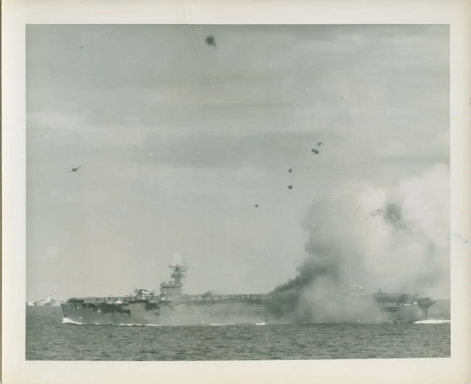 USS Petrof Bay (CVE-80) Under Attack, Smoke Rising from Flight Deck, WWII Pacific Theater