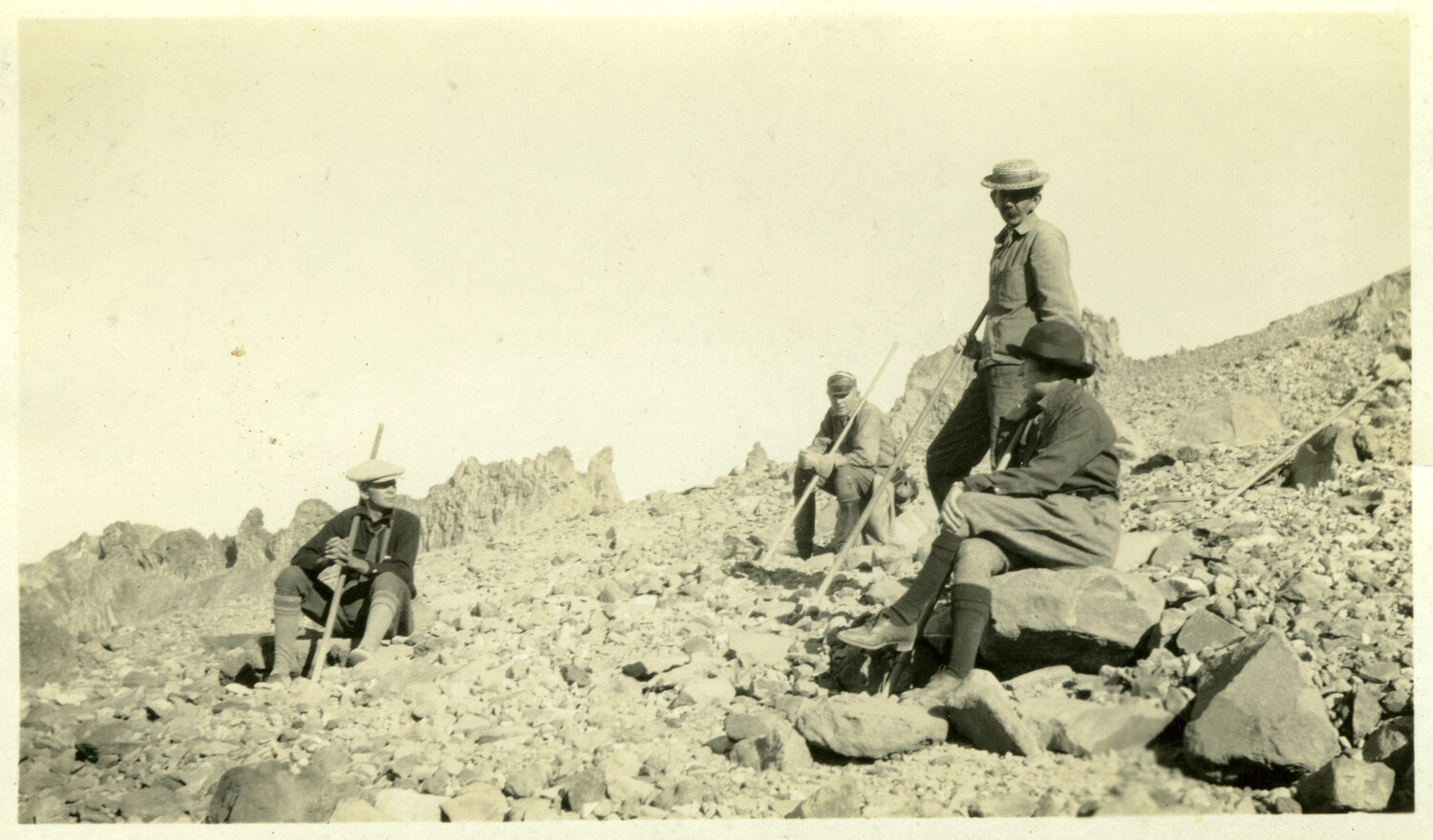 Hikers Resting on a Rocky Mountain Slope, Philippines, Early 20th Century