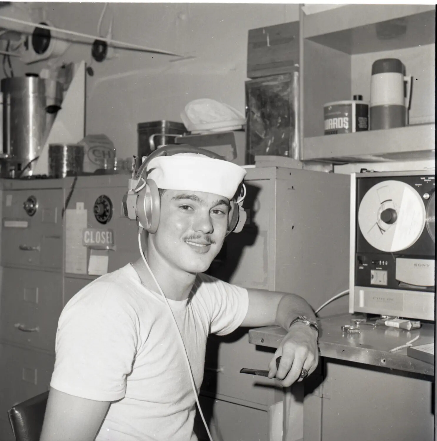 Navy Sailor with Headphones Aboard USS Ticonderoga, Vietnam War Era