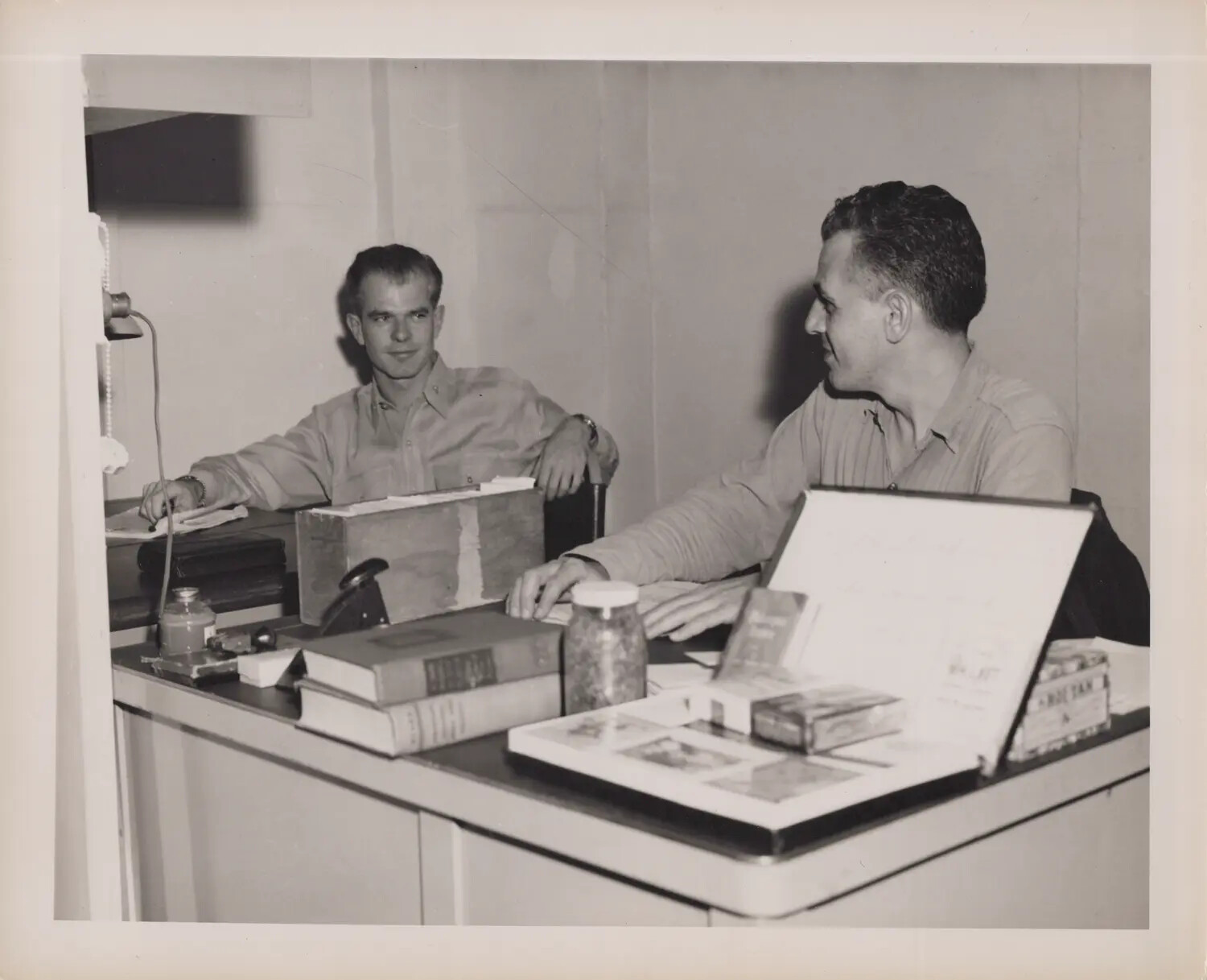 Two Sailors at Office Desk Aboard Ship, WWII Era