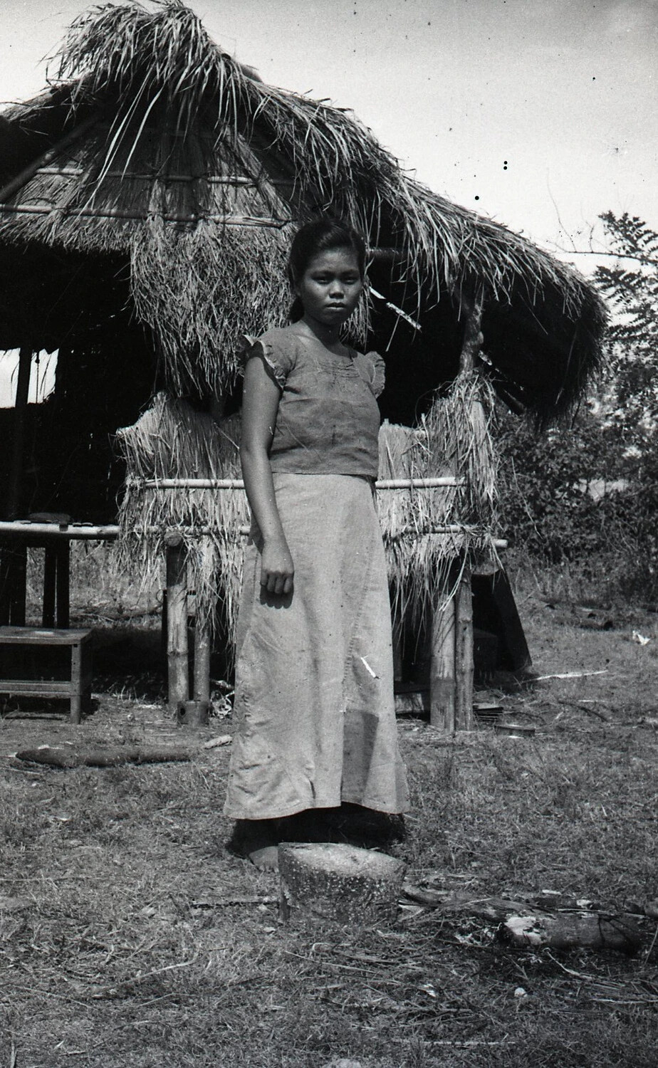 Filipina Woman Before a Nipa Hut, Luzon, Philippines, World War II