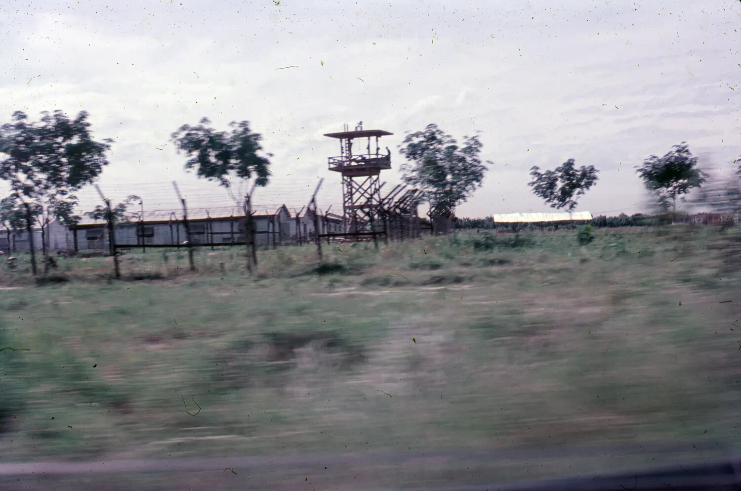 Perimeter Guard Tower and Base Defenses, South Vietnam Air Base, 1965