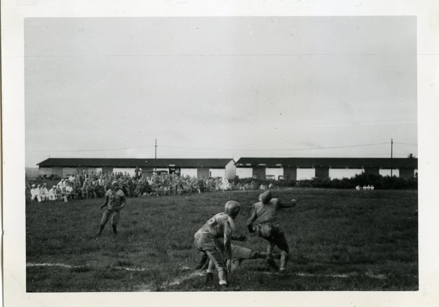 Servicemen Playing Football at Naval Air Transport Squadron Base, Agana, Guam