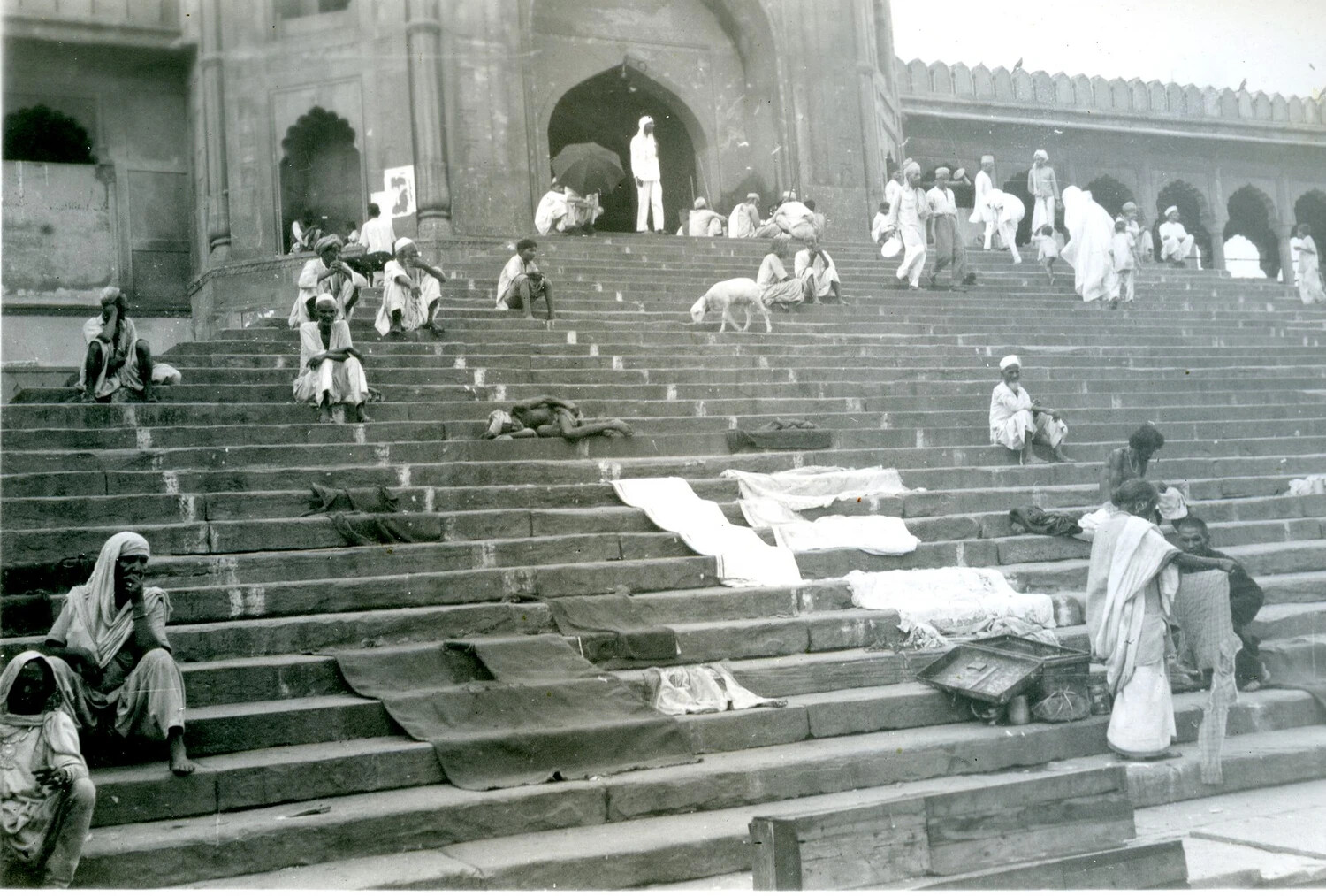 Pilgrims and Daily Life on the Steps of a Grand Mosque, Delhi, India — WWII-Era Travel Photograph