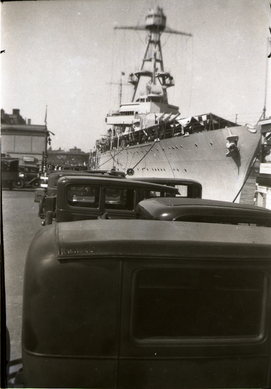 Warship Bow and Pagoda-Style Superstructure Moored at a Chinese Treaty Port, with Automobiles in Foreground, c. 1930s