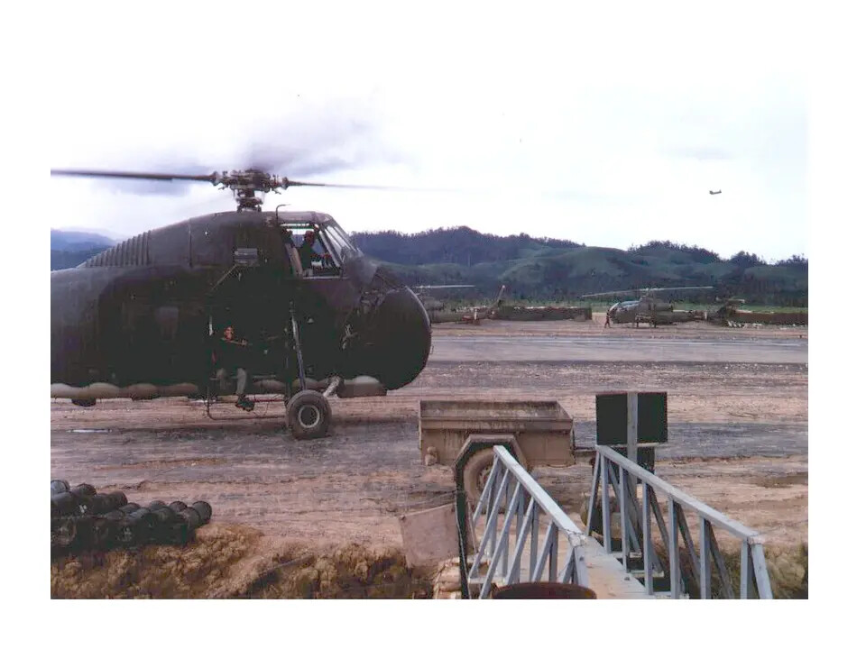 UH-1 Huey Helicopter with Rotors Turning at Forward Vietnam Airstrip — Don Engebretsen's First Flight
