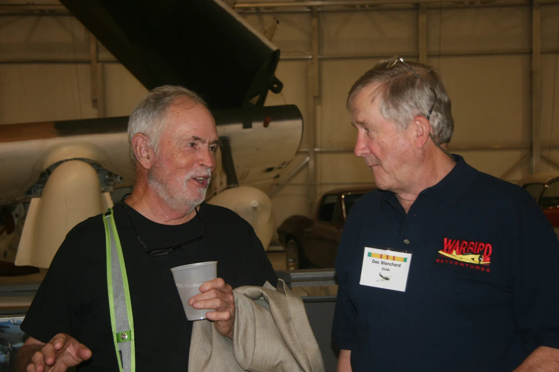 Attendees in Conversation at Operation Tailwind Reunion Event, 2016