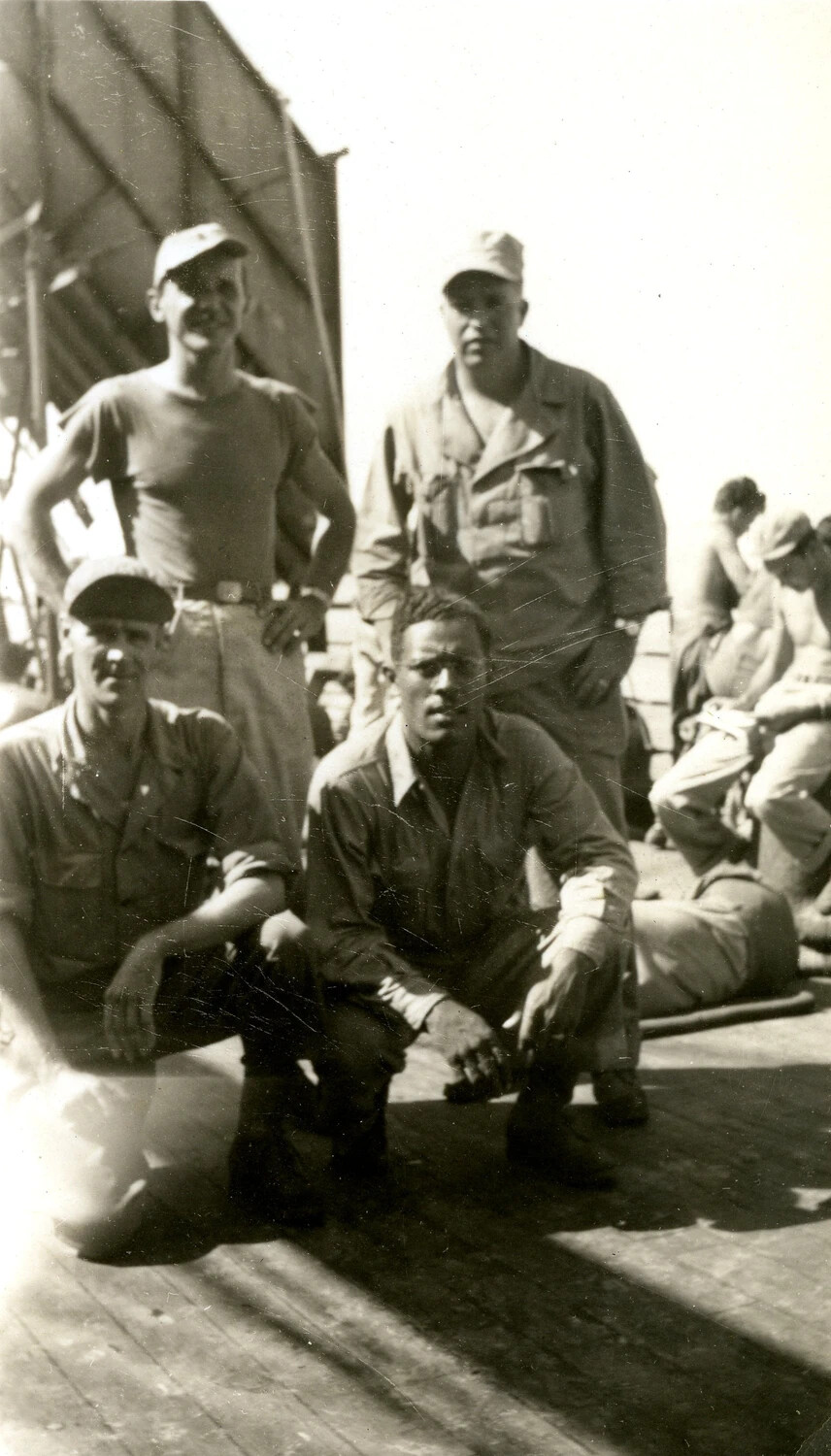 Informal Group Portrait of U.S. Servicemen on Troop Ship Deck, Pacific Theater, World War II (345th Bomber Group Collection)