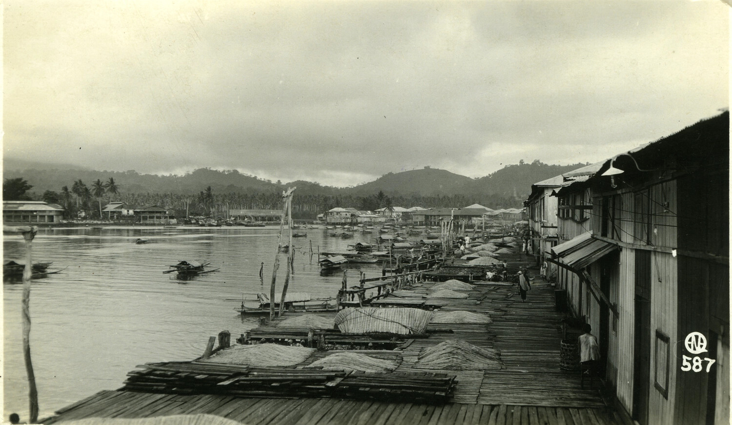 Riverside Village and Wooden Pier, Philippines, Early 1900s (Carl Stone Collection)