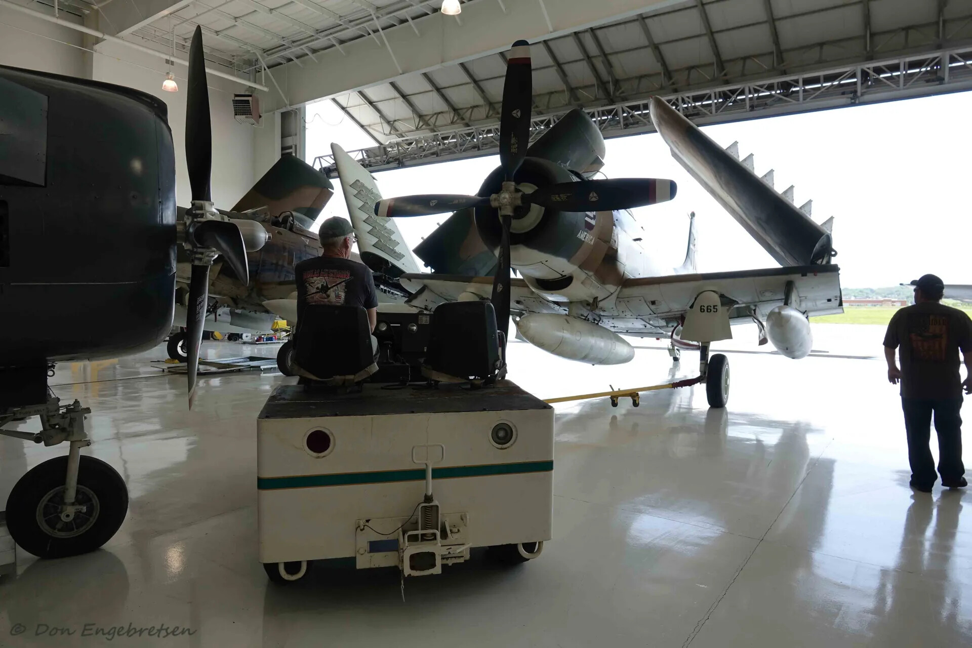 A-1 Skyraiders in Hangar with Ground Crew, Cavanaugh Flight Museum