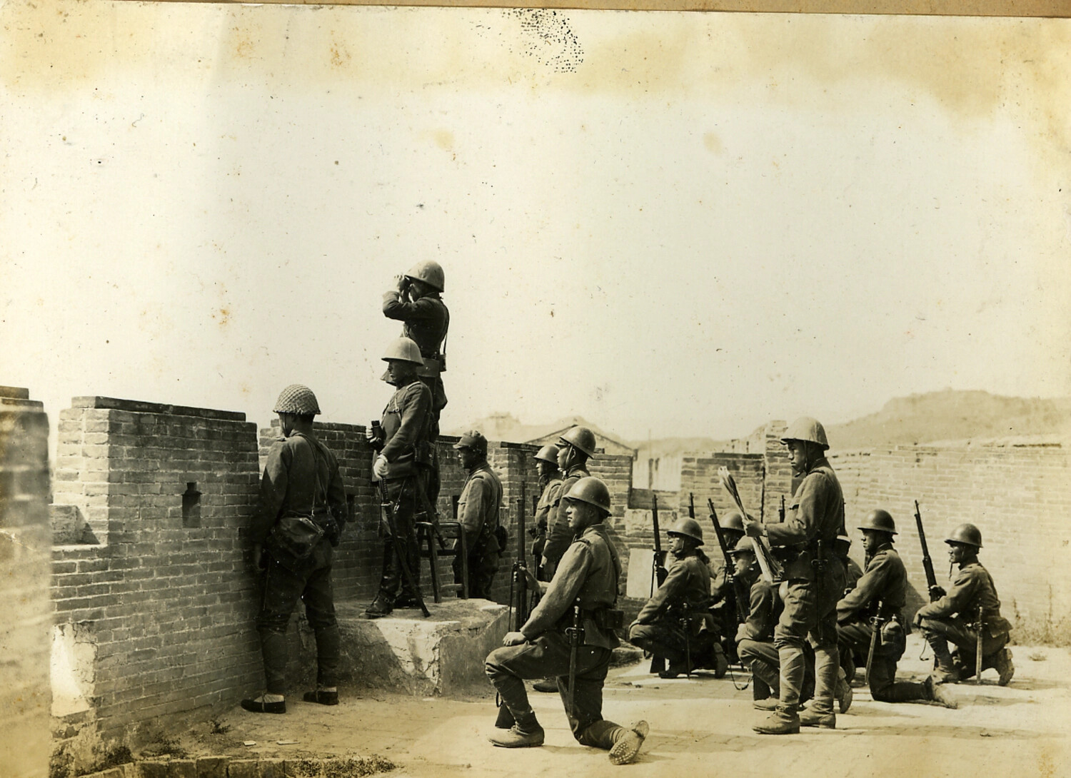 Japanese Army Soldiers in Defensive Positions Atop a Fortified Wall, North China