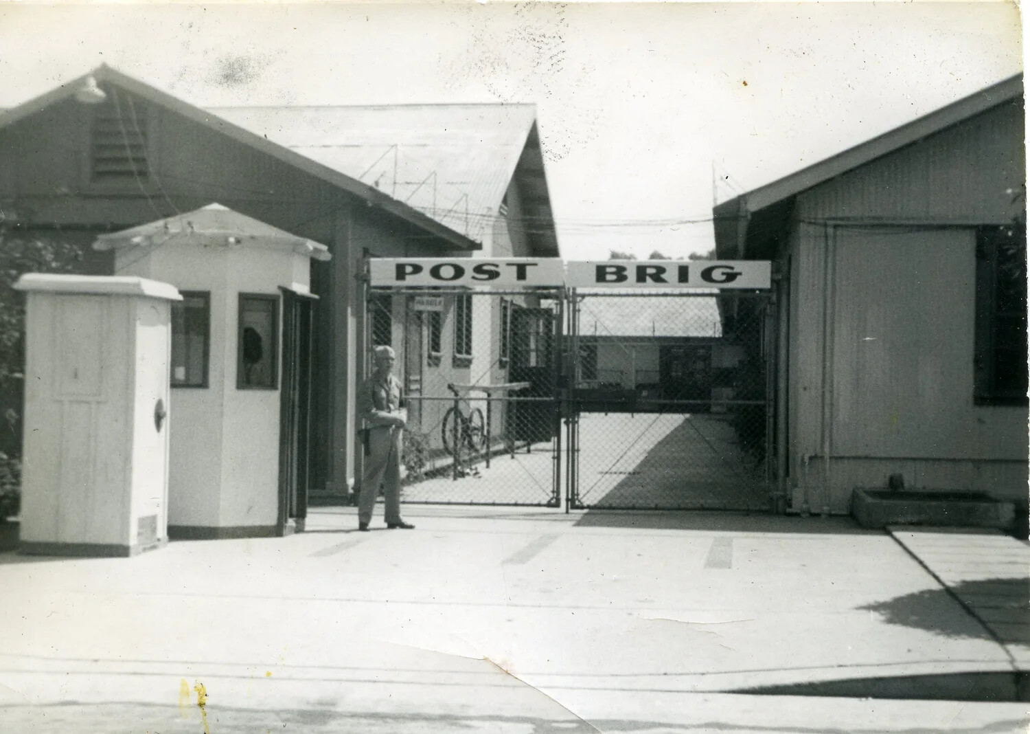 Marine Sentry at 'Post Brig' Gate, Marine Corps Base Installation, WWII Era