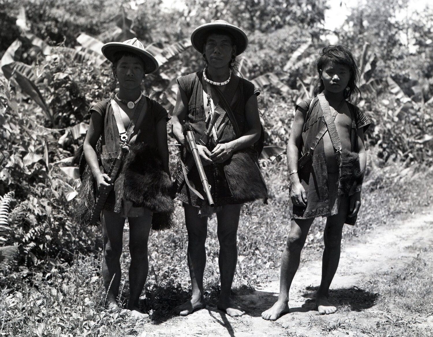 Three Naga (or Related Assam-Burma Border Hill Tribe) Individuals in Traditional Dress, Dinjan Region, WWII China-Burma-India Theater