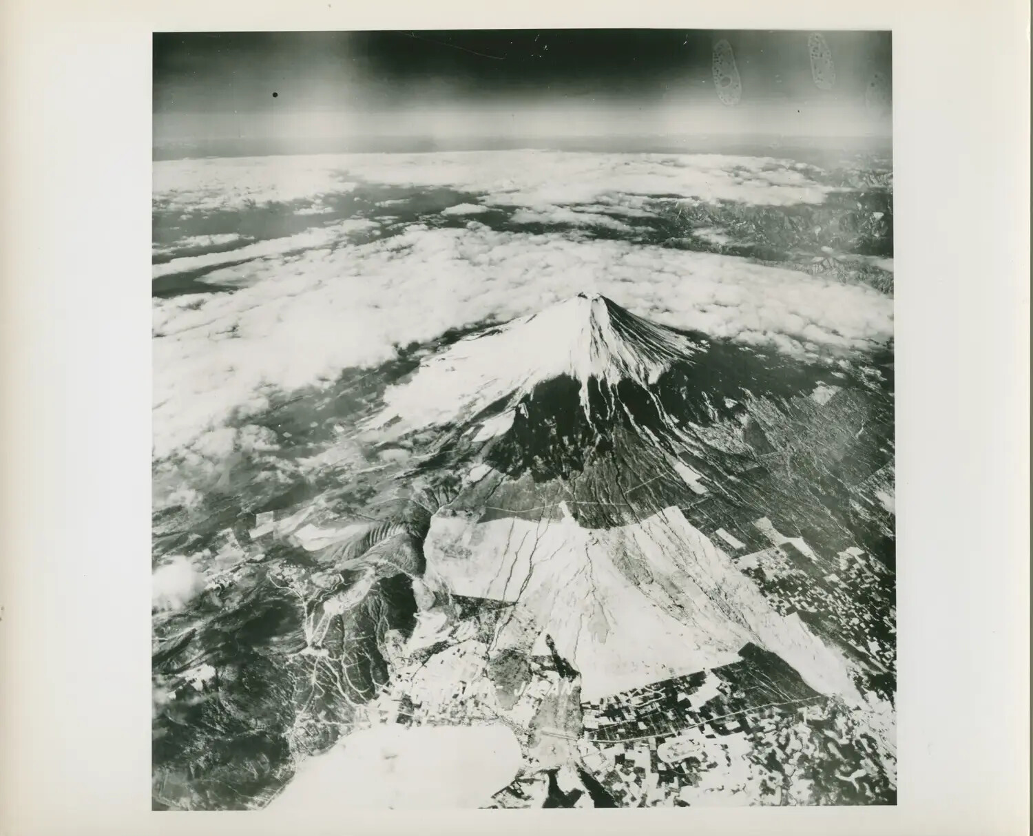 Aerial Photograph of Mount Fuji, Japan, from a U.S. Navy Aircraft — USS Petrof Bay (CVE-80) Collection
