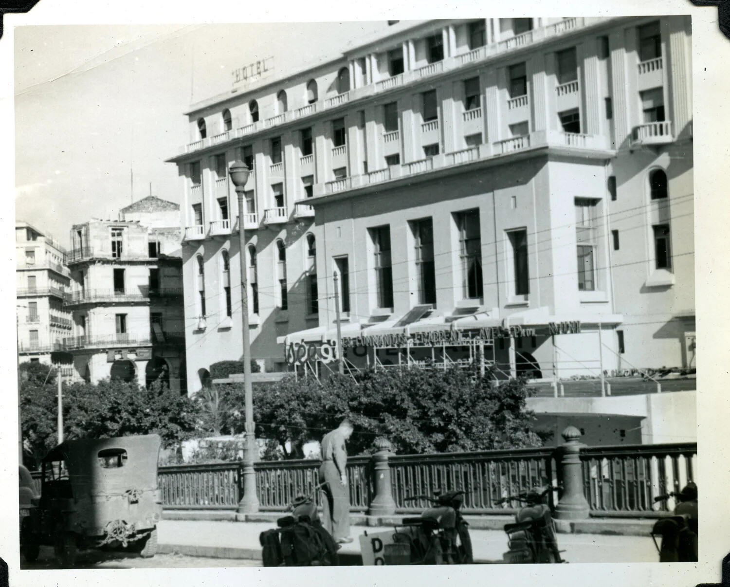American Serviceman and Military Truck Before a City Hotel, WWII Mediterranean/North African Theater