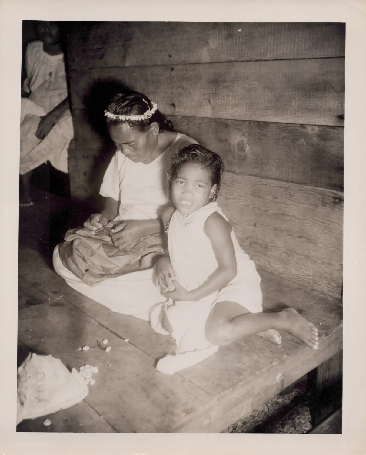 Pacific Islander Woman and Child, Wooden Dwelling Interior (WWII-Era Pacific Theater)