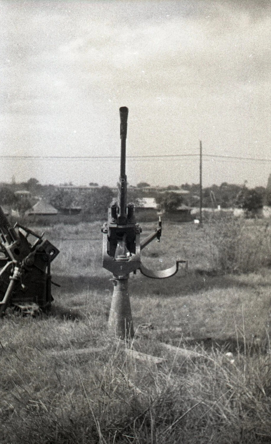 Single-Barrel Anti-Aircraft Gun, Head-On View with Second Gun at Left, Luzon, Philippines, WWII