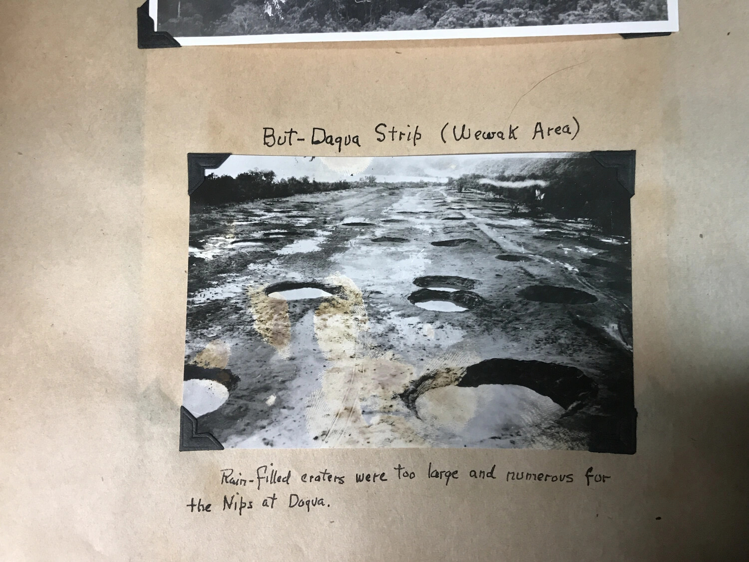 Scrapbook Page: "But-Daqua Strip (Wewak Area)" – Bomb-Cratered Japanese Airfield, New Guinea, World War II
