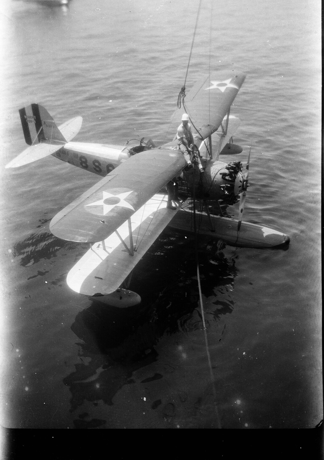 U.S. Navy Scout-Observation Floatplane Being Recovered by Crane, China Station, 1930s