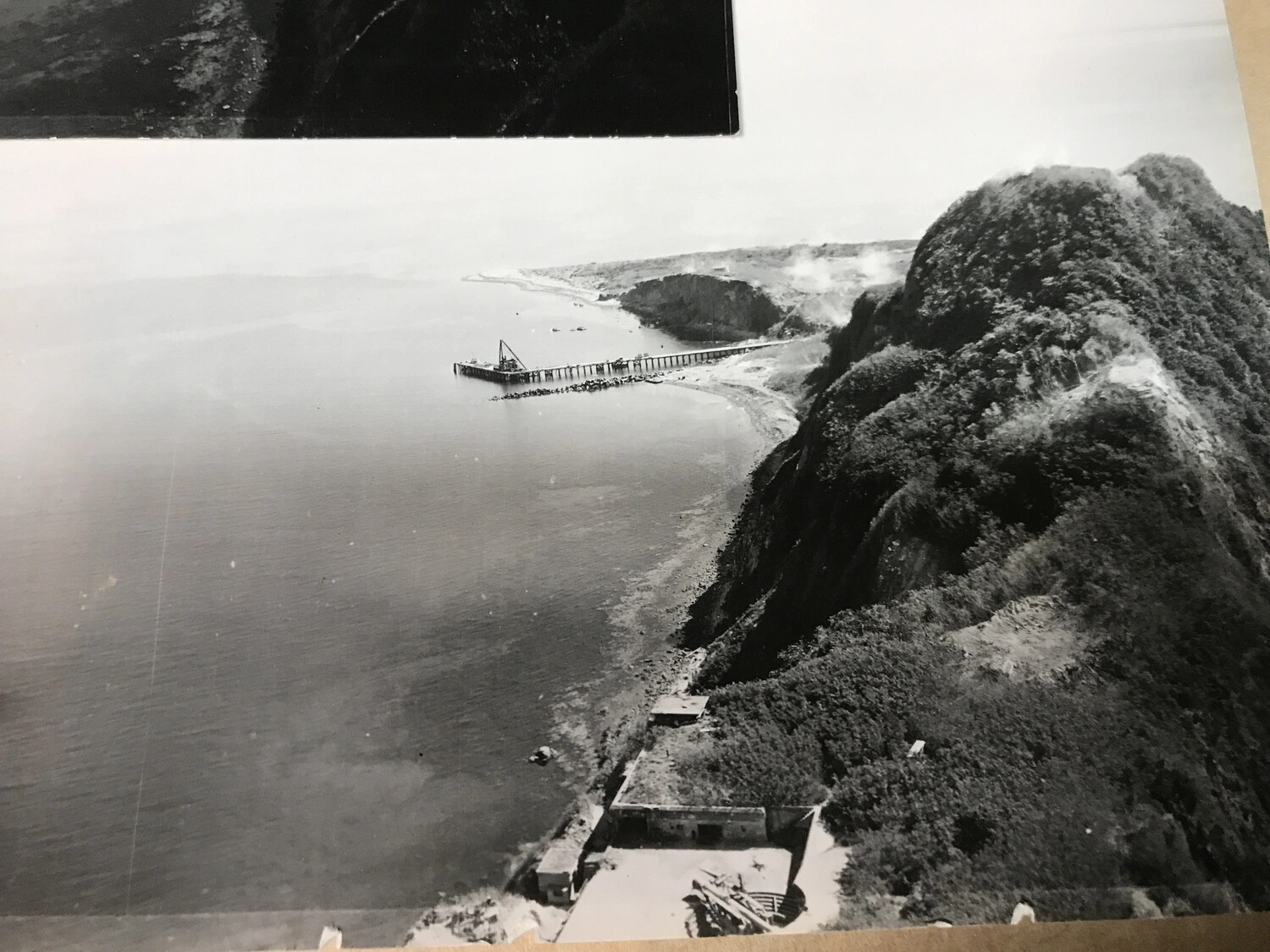 Aerial Photograph of Fortified Coastal Headland and Pier, Pacific Theater, Possibly Corregidor