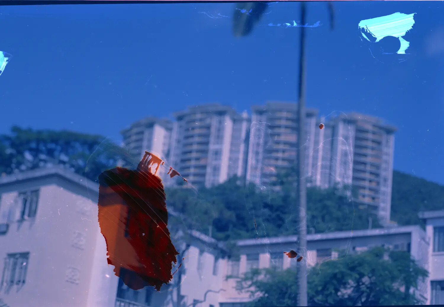 Deteriorated Color Negative of Hillside Apartment Buildings, Likely Hong Kong, USS Ticonderoga Collection, Vietnam War Era