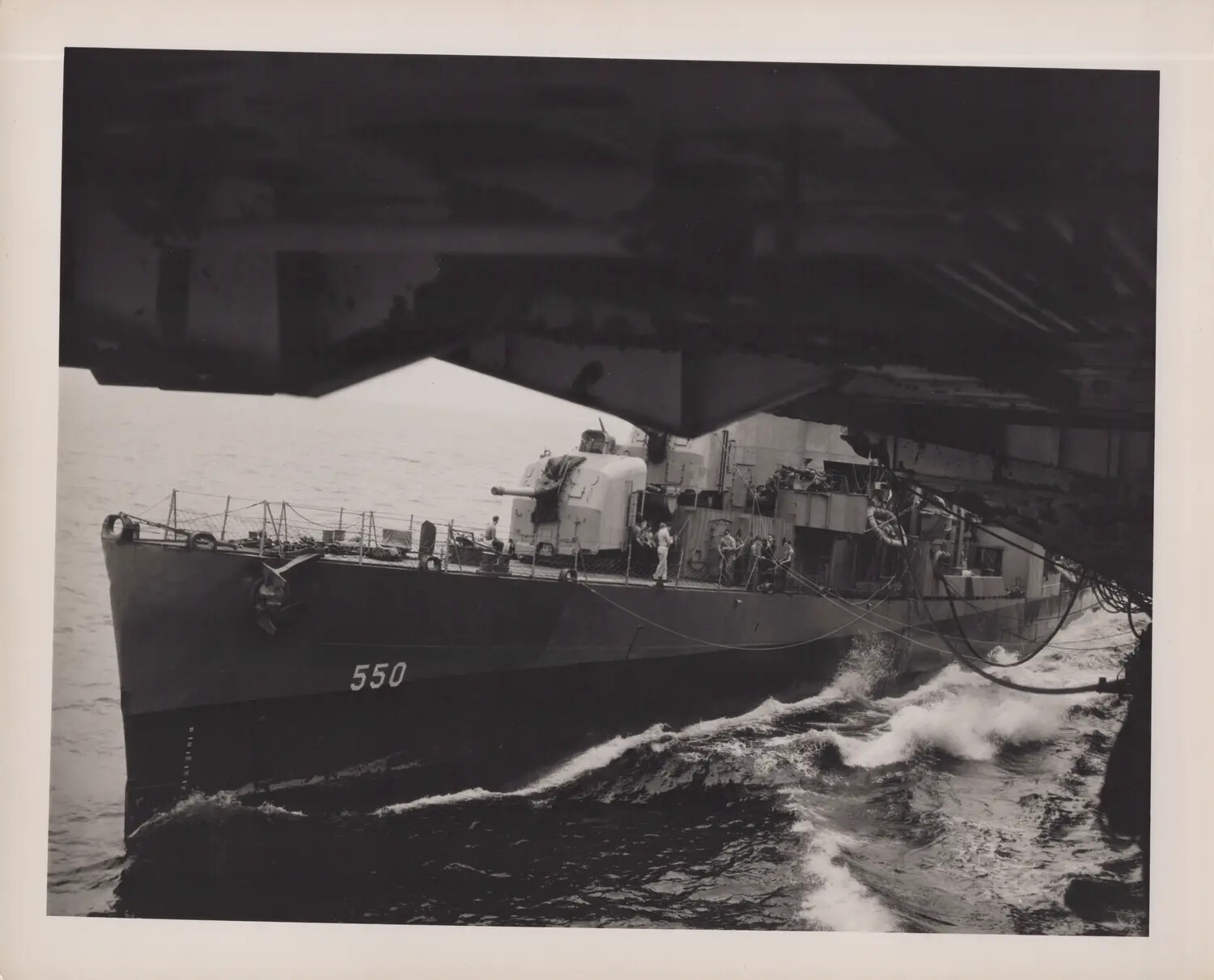 USS DE-550 Alongside Escort Carrier During Underway Replenishment, WWII Pacific Theater