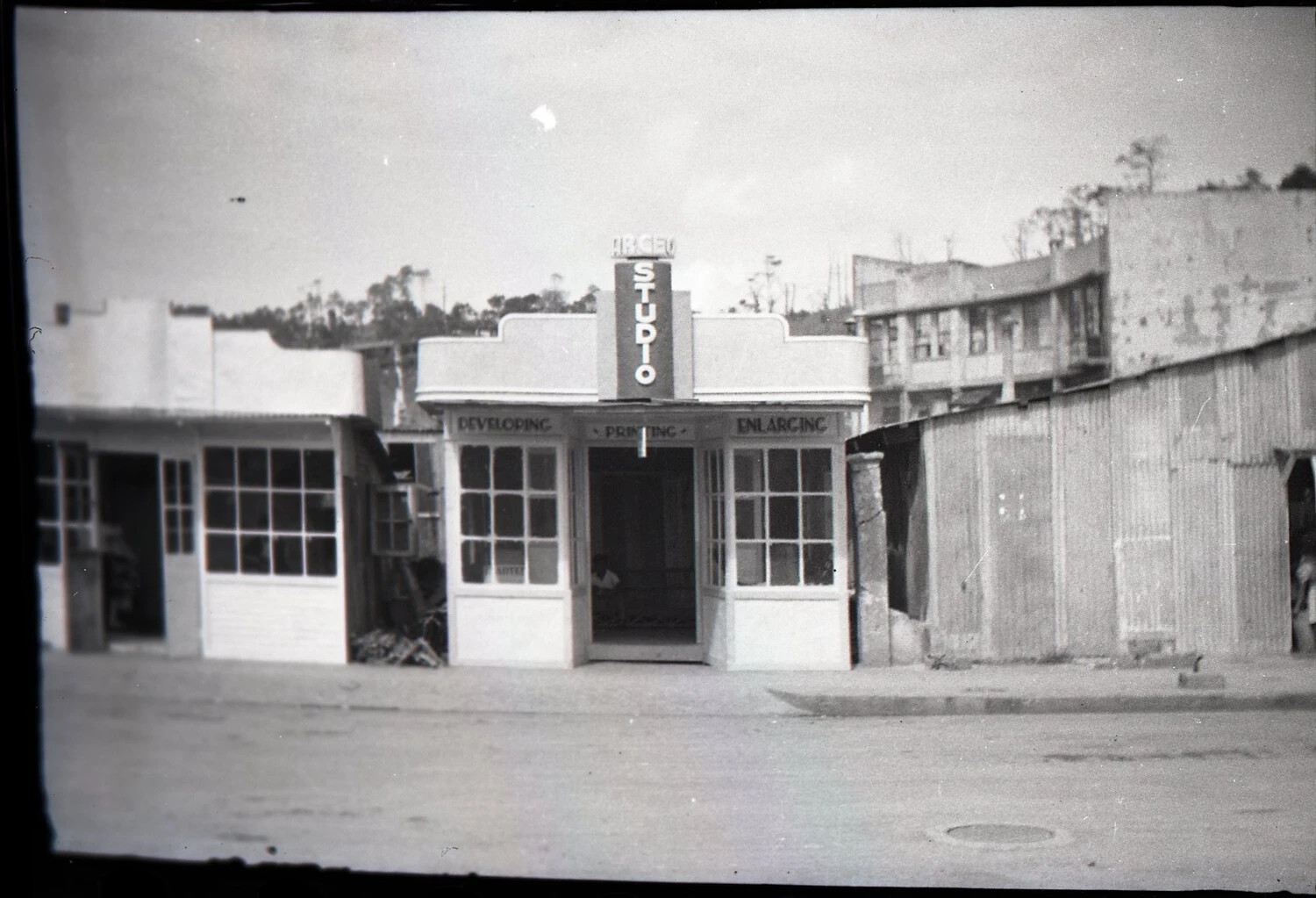 Photography Studio Storefront with Art Deco Signage, Luzon, Philippines, WWII Era