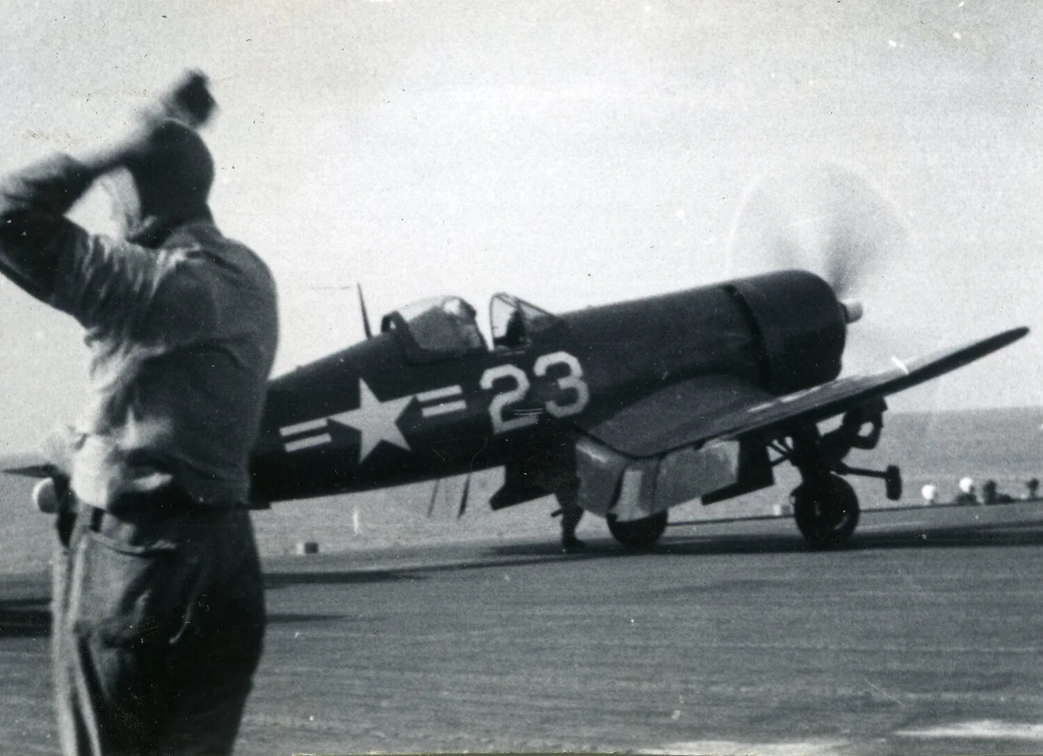 Vought F4U Corsair No. 23 with Flight Deck Director, VMF-214, 1945