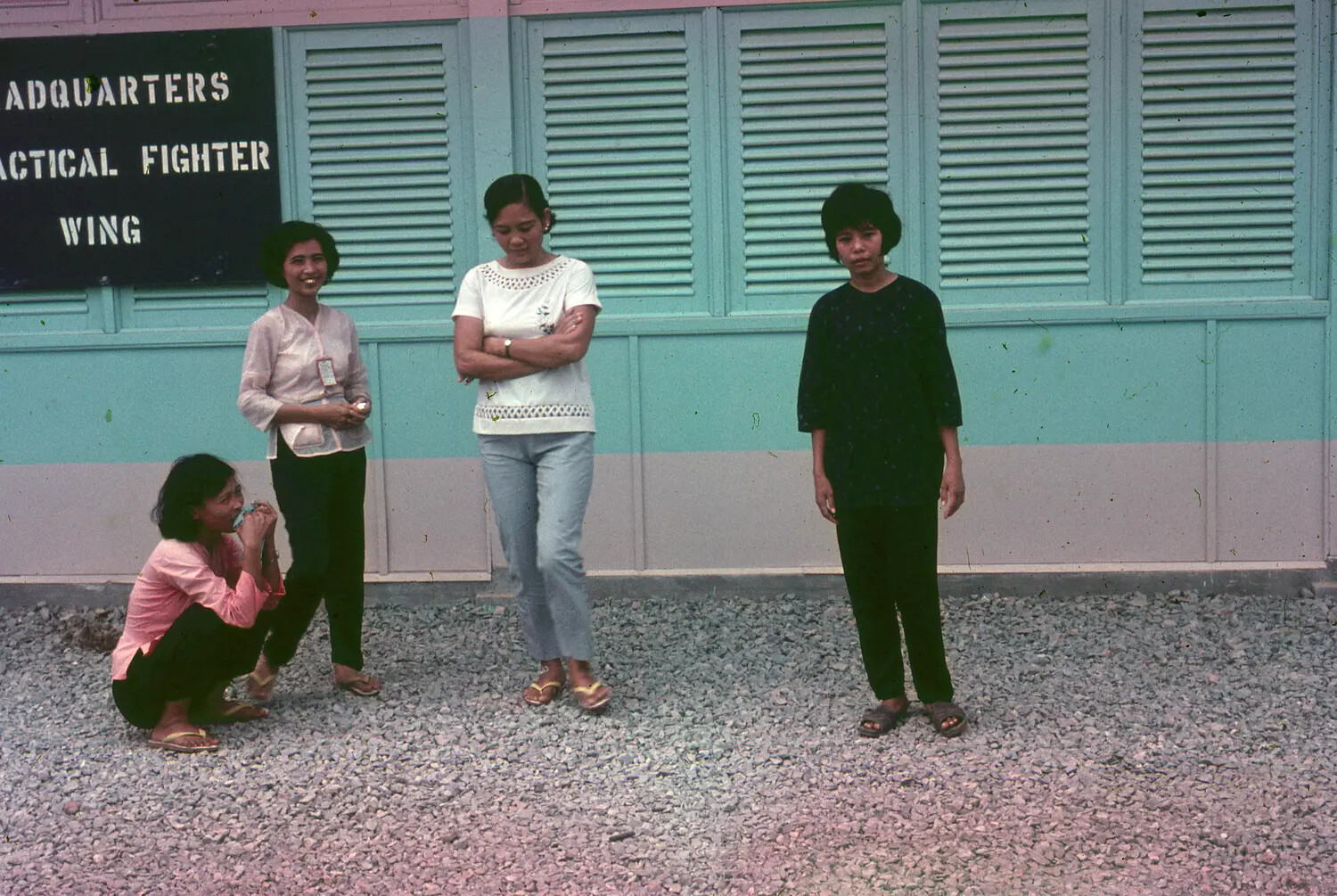 Vietnamese Women Outside 3rd Tactical Fighter Wing Headquarters Building, South Vietnam, c. 1965-1966