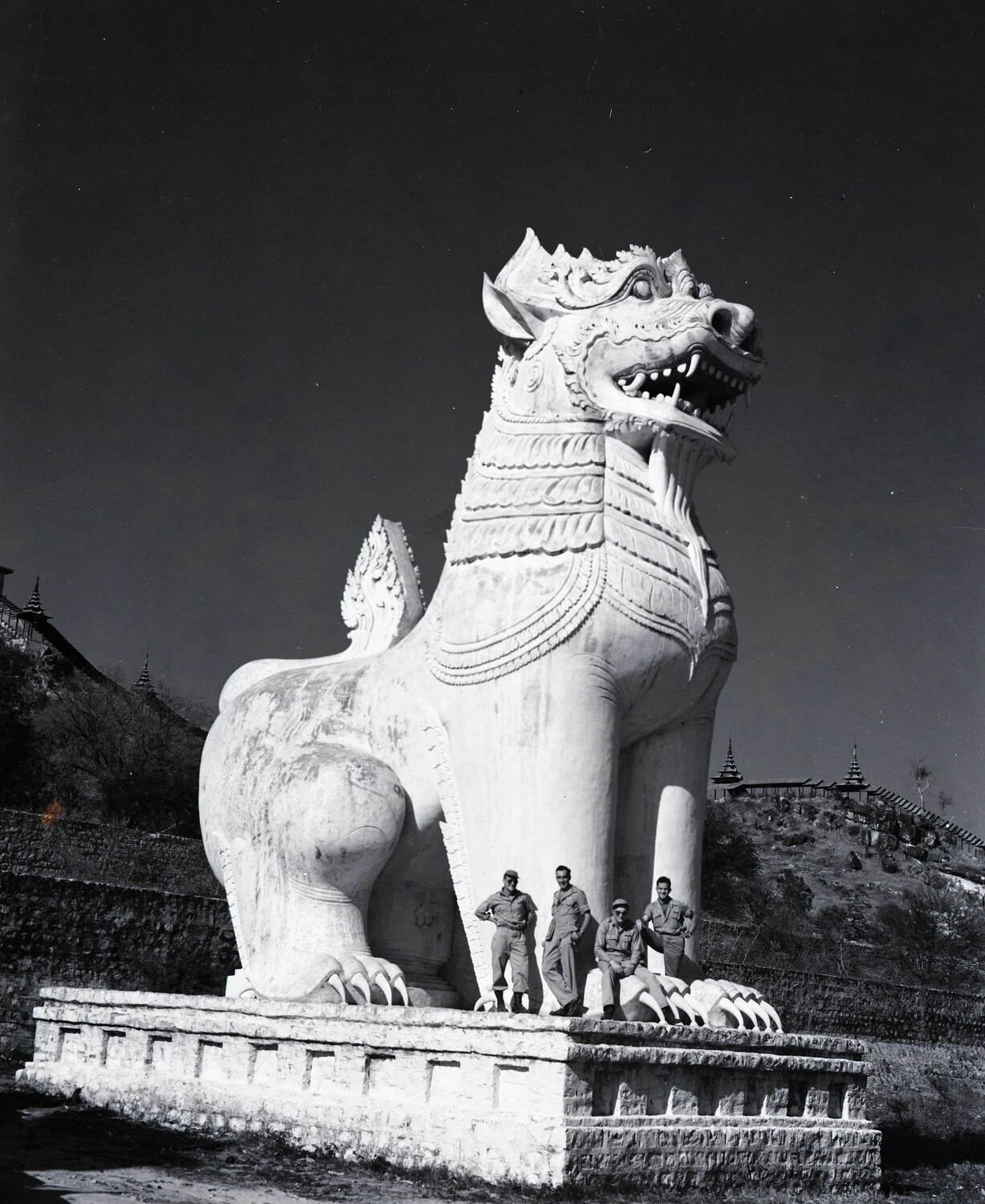 American Servicemen Posing at the Giant Chinthe Guardian Statue, Mandalay Hill, Burma