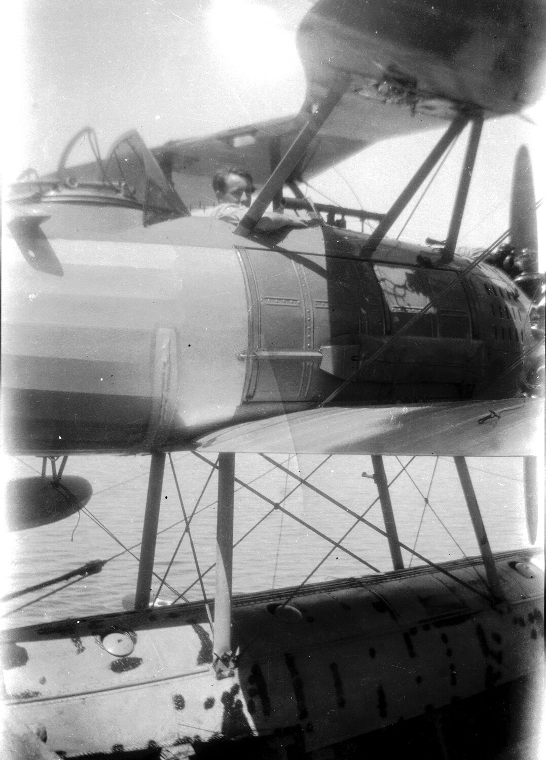 U.S. Navy Biplane Floatplane with Pilot in Cockpit, China/Pacific Station, 1930s