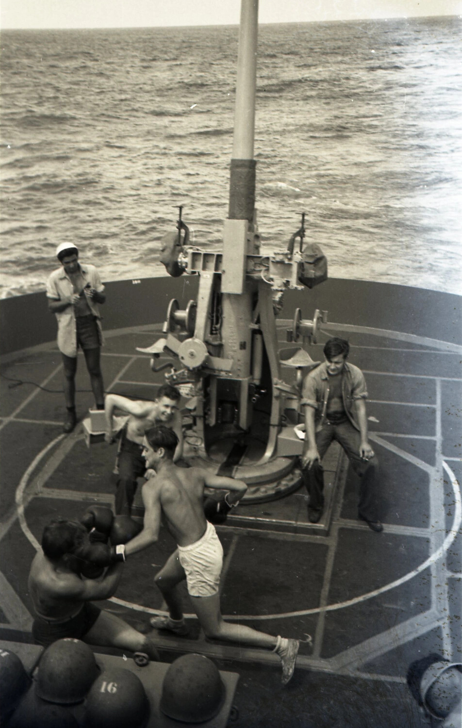 Sailors Boxing on Ship's Deck Beside Gun Mount, WWII