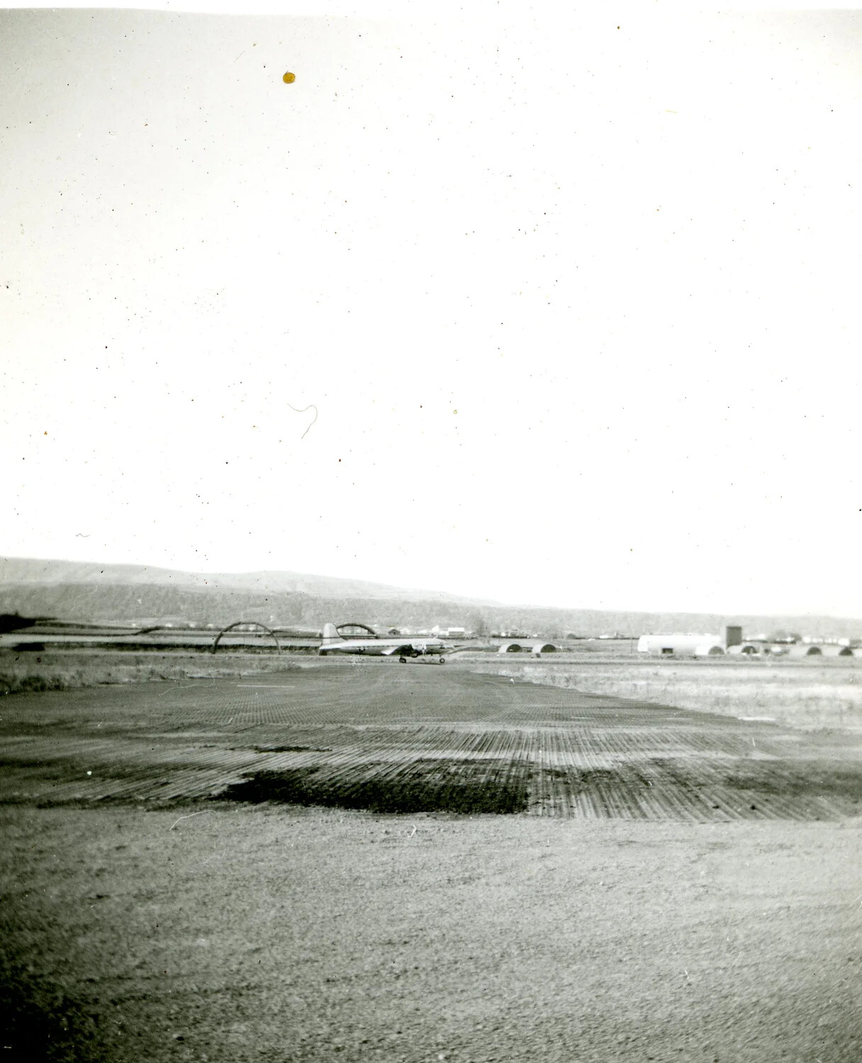 Airfield with Twin-Engine Transport and Quonset Huts, Kessler Collection, 1946