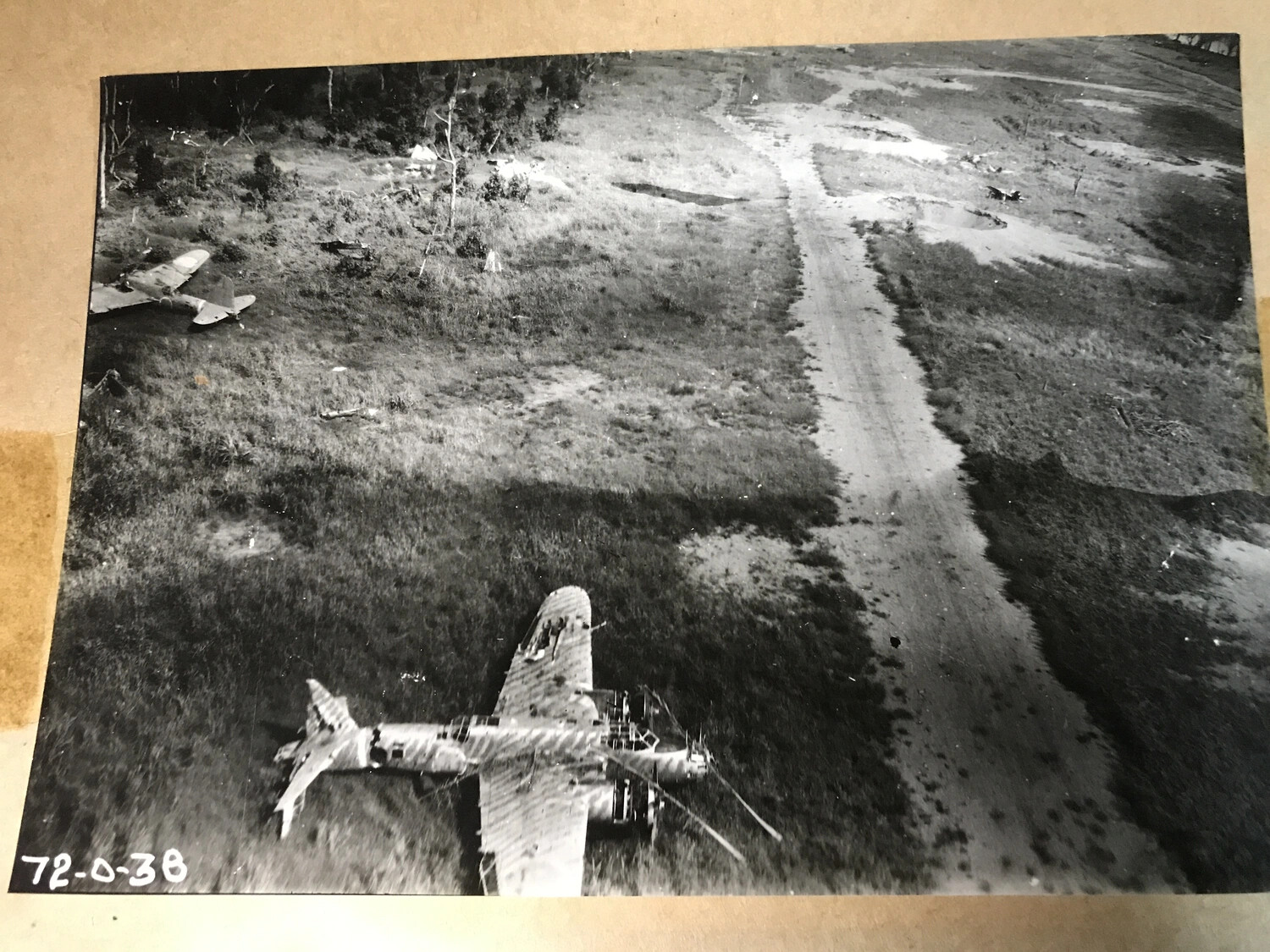 Wrecked Japanese Aircraft Beside Airfield Taxiway, New Guinea Strike Damage (Full Print, No. 72-0-38)