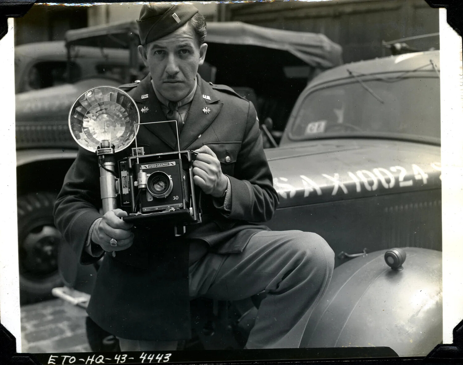 U.S. Army Signal Corps Officer with Speed Graphic Press Camera, ETO Headquarters, 1943