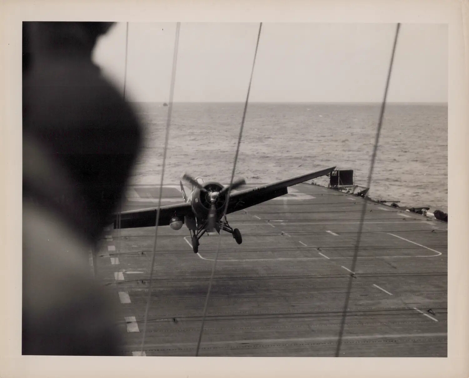 FM-2 Wildcat Fighter on Final Approach to Escort Carrier Flight Deck, WWII Pacific Theater