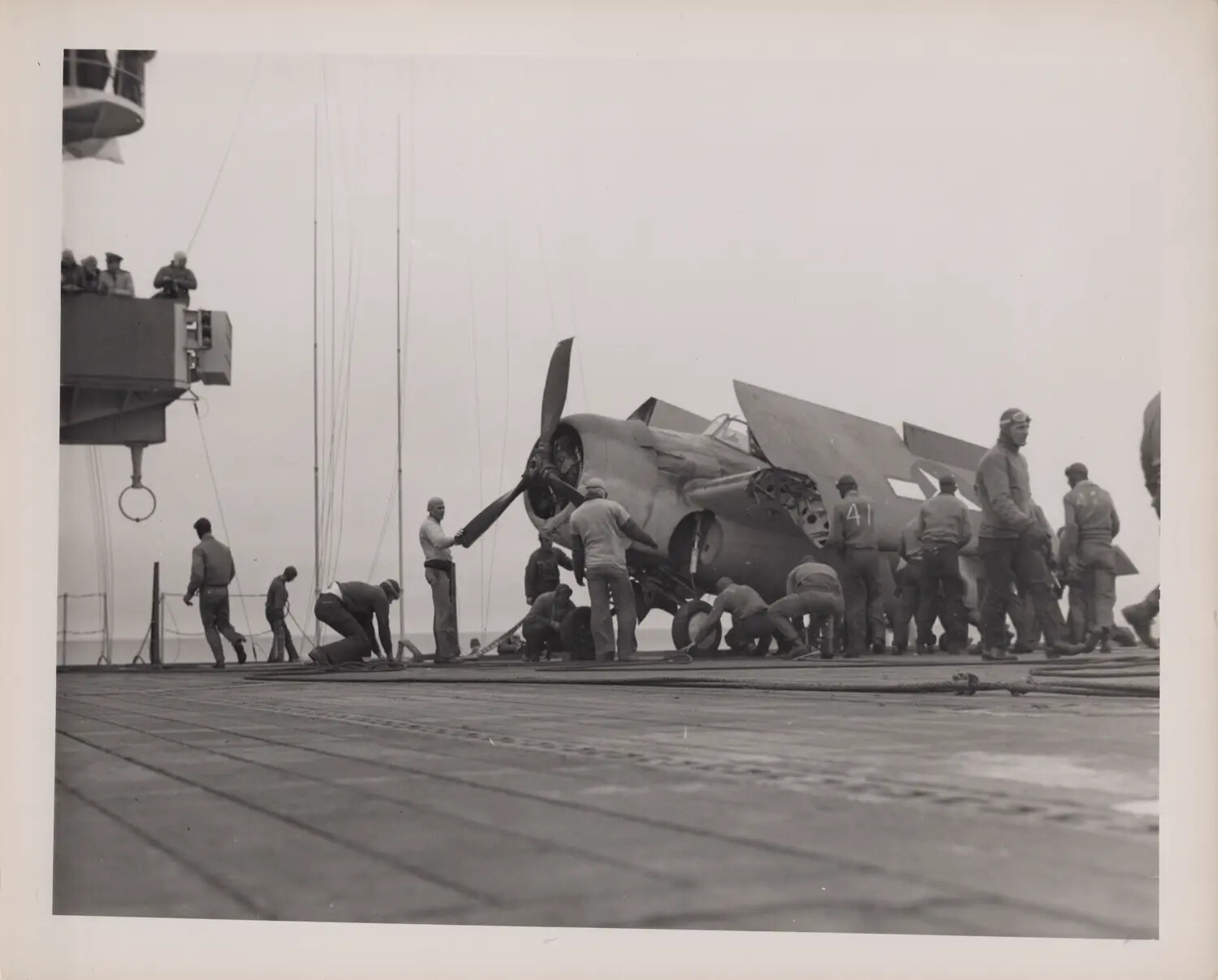 Deck Crew Recovering Damaged Aircraft No. 41 After Flight Deck Accident, World War II