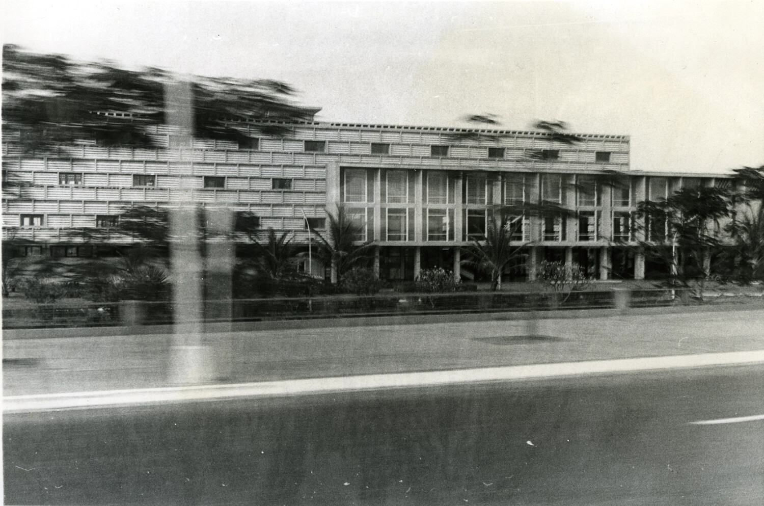 Modernist Institutional Building in Motion-Blurred Roadside View, Phnom Penh, Cambodia, c. 1960s