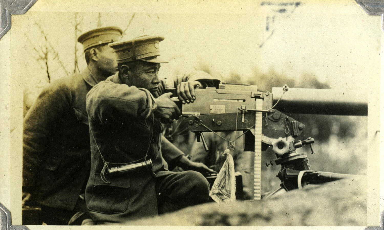 Officers with a Water-Cooled Maxim-Type Machine Gun, c. 1930s