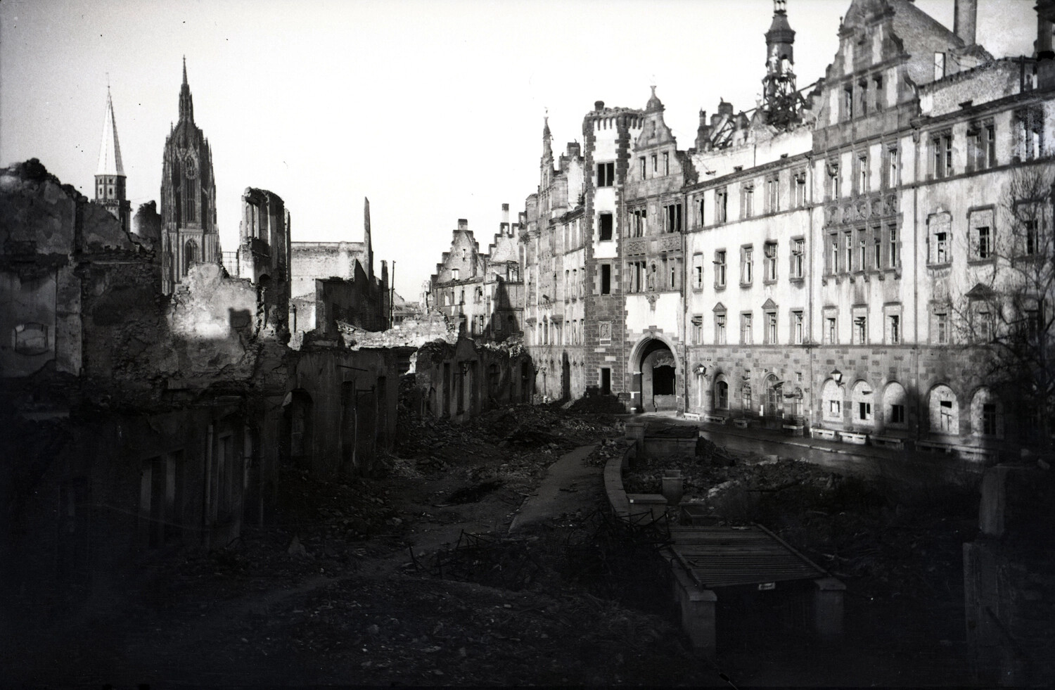 Ruined Old Town Square with Surviving Cathedral Spire and Historic Facade, Postwar Germany