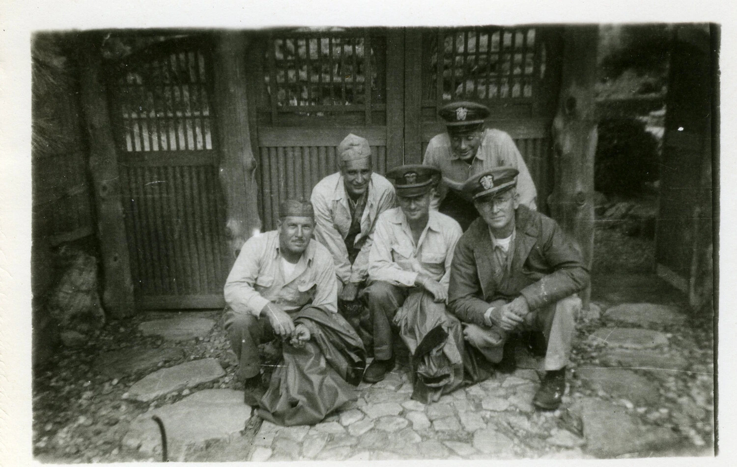 U.S. Navy Personnel Posed Before a Traditional Wooden Gate, Occupied Japan