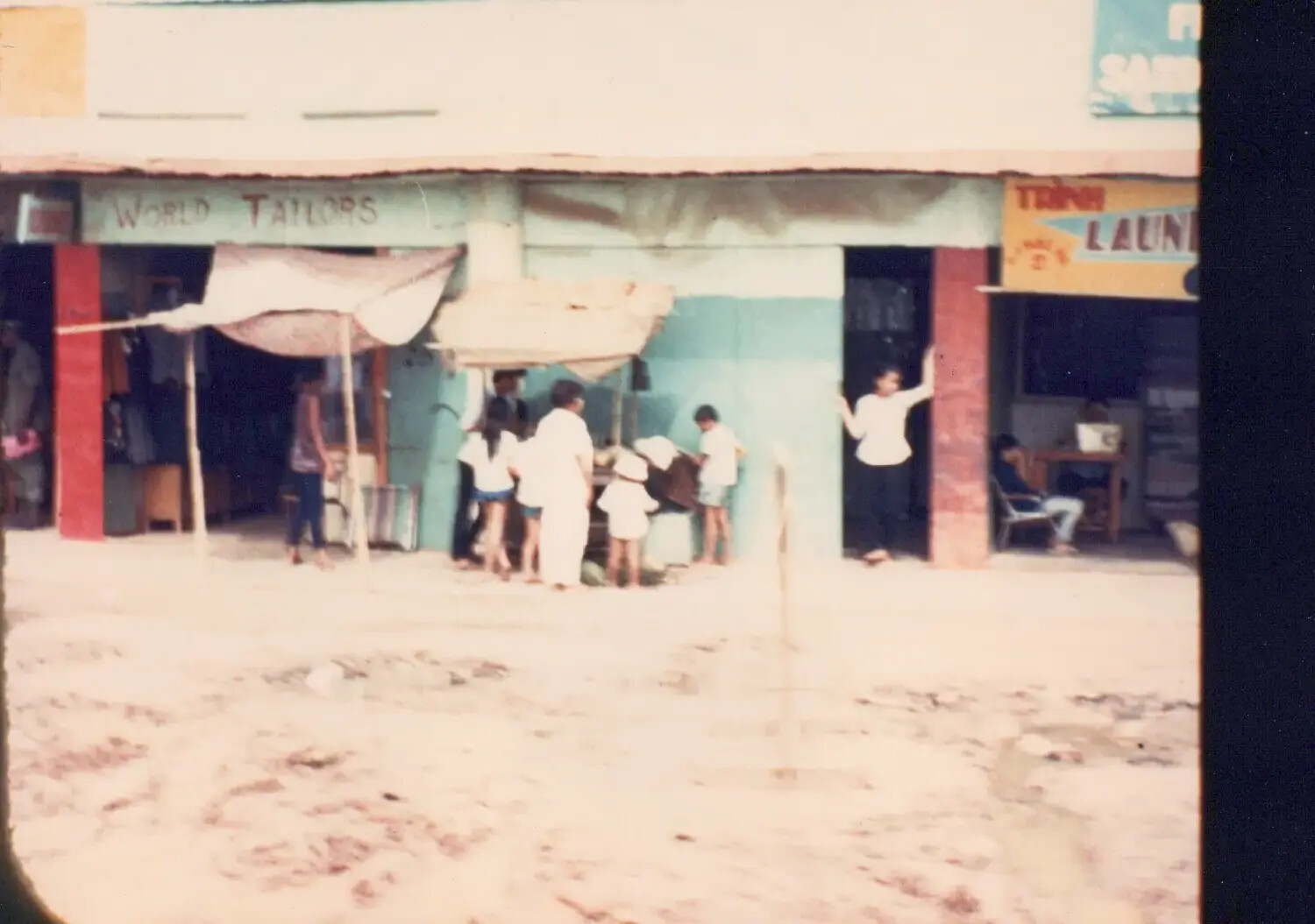 Street Scene with Shops and Food Vendor, Cu Chi, South Vietnam, 1967