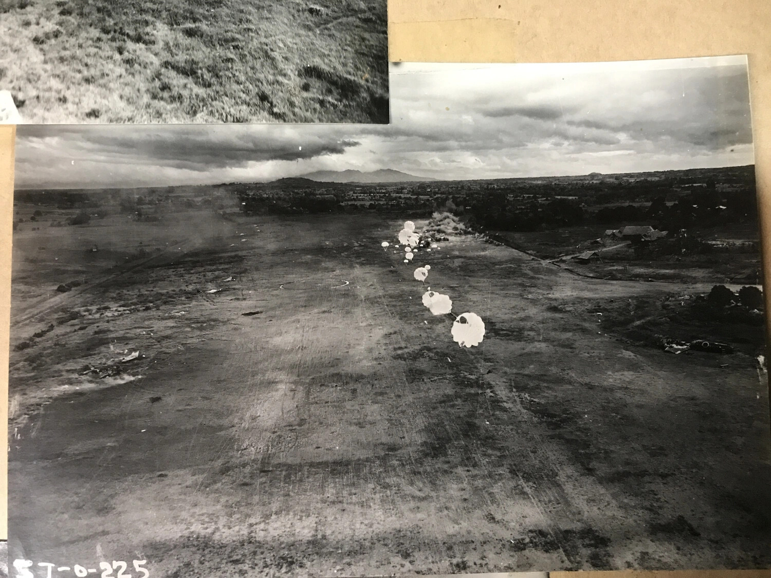 String of Parafrag Bombs Over Airfield Target with Photo Reference Number '57-0-225'