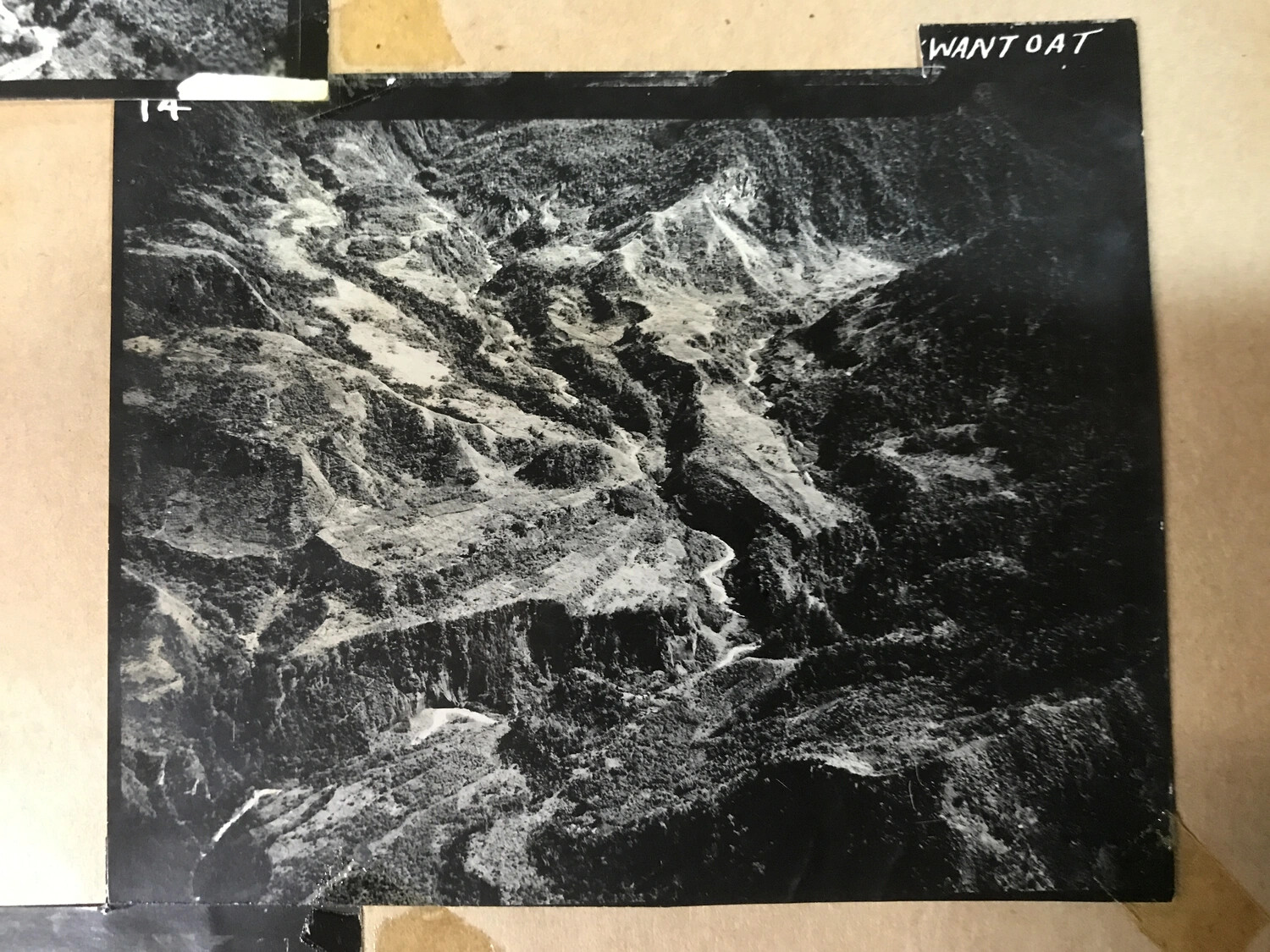 Aerial Reconnaissance Photograph of Mountainous Terrain Labeled 'Wantoat,' New Guinea, World War II