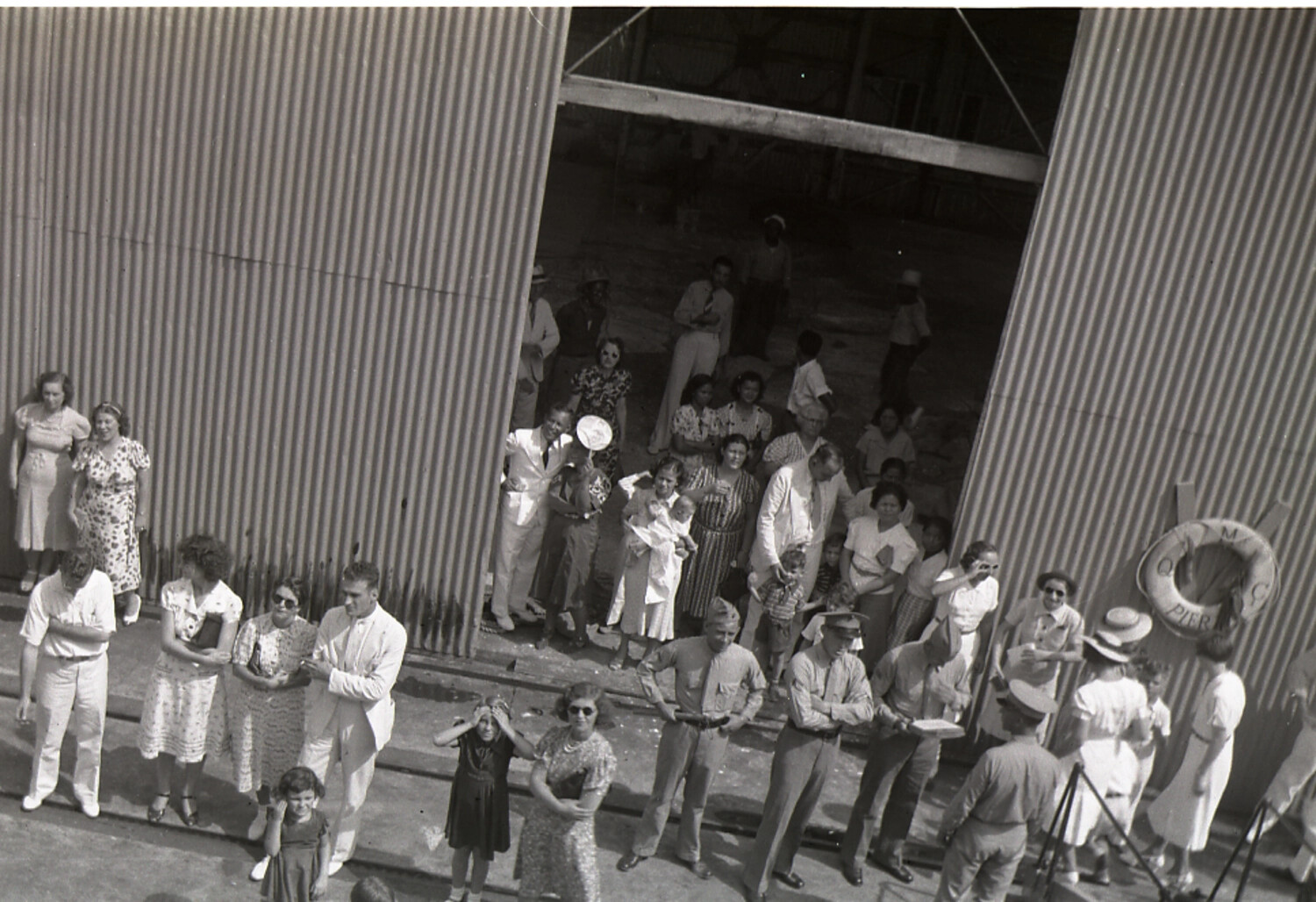 Group Portrait of Expatriate Families at a Pier Warehouse, China, 1930s